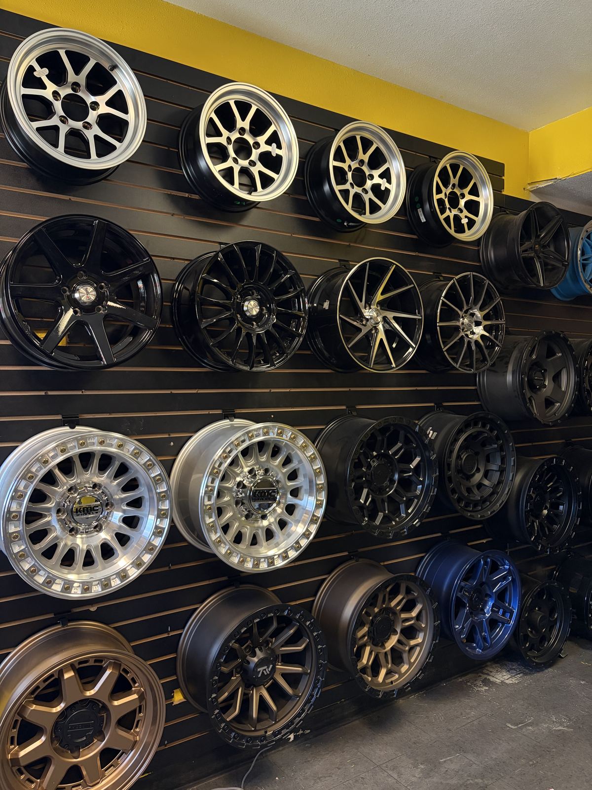 Wall of alloy wheels at Garcia's